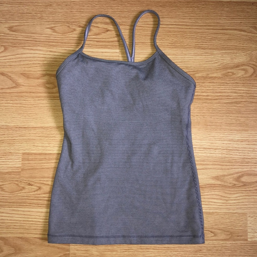Lululemon tank top with build in bra , size 4.